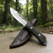 High-hardness outdoor adventure straight knife, with leather blade cover, essential hand-forged knife for wilderness survival. Super sharp blade with anti-slip wooden handle